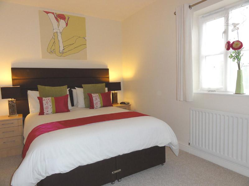 Large comfortable king bed, fitted mirrored wardrobes and dressing table.