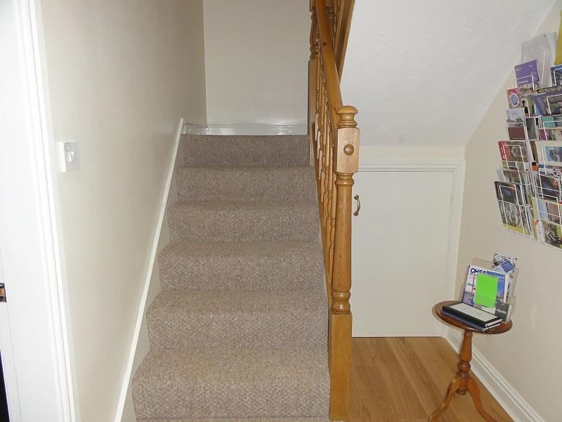 7 stairs lead to half landing with 6 stairs to main landing.